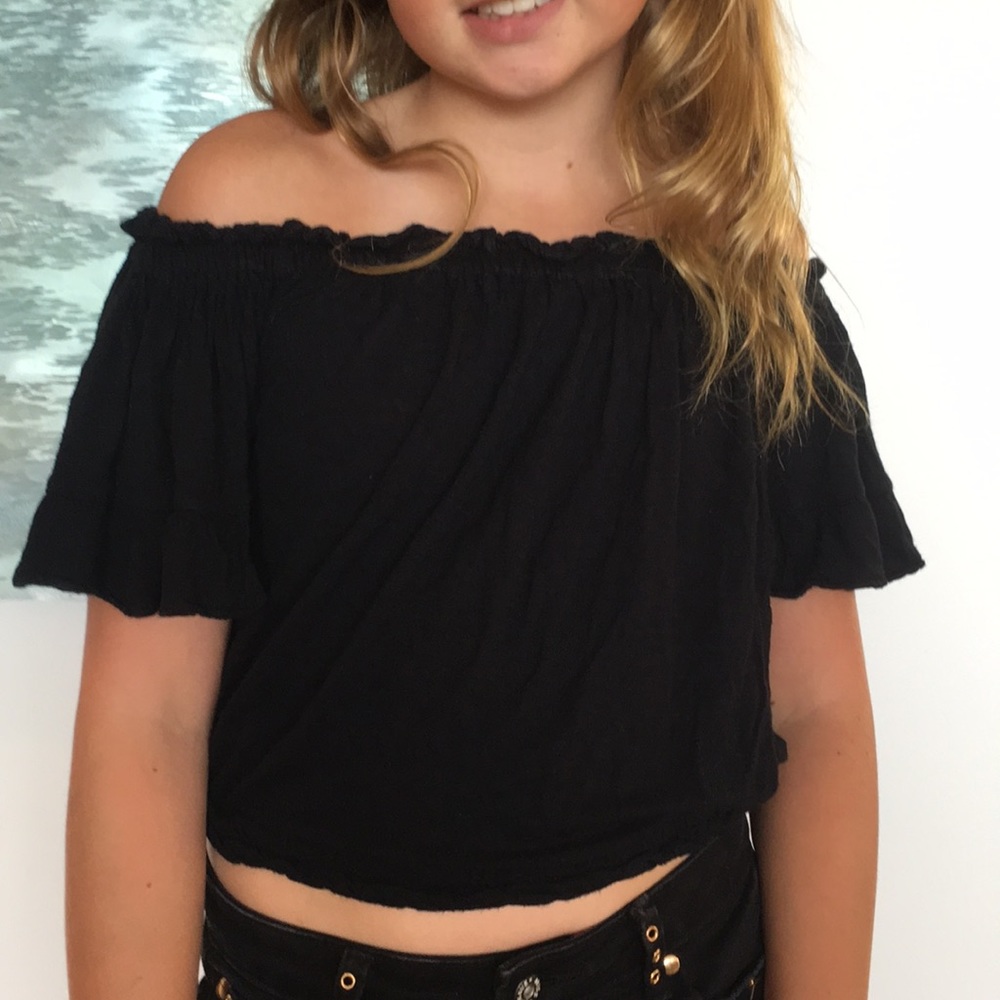Black Emma and Sam of the shoulder shirt